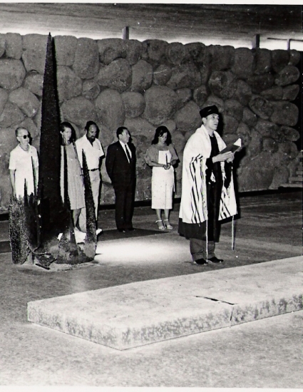 Betty and David light the Yad Vashem flame in honor of Victor and Josephine Guicherd